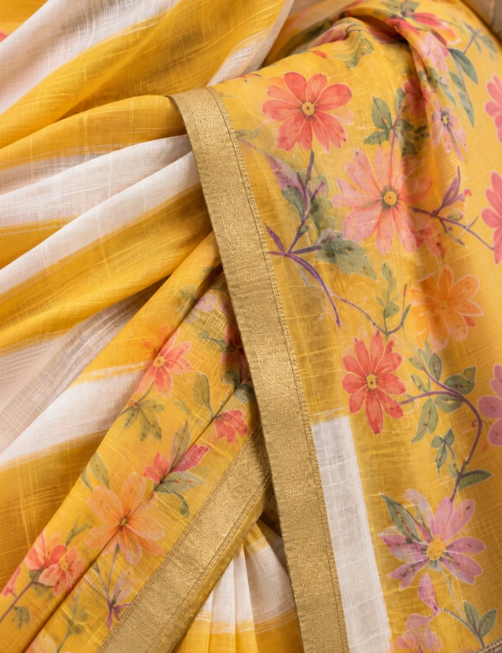 House Of Paramya yellow and white striped linen cotton saree with floral print panels and a gold-toned edge border