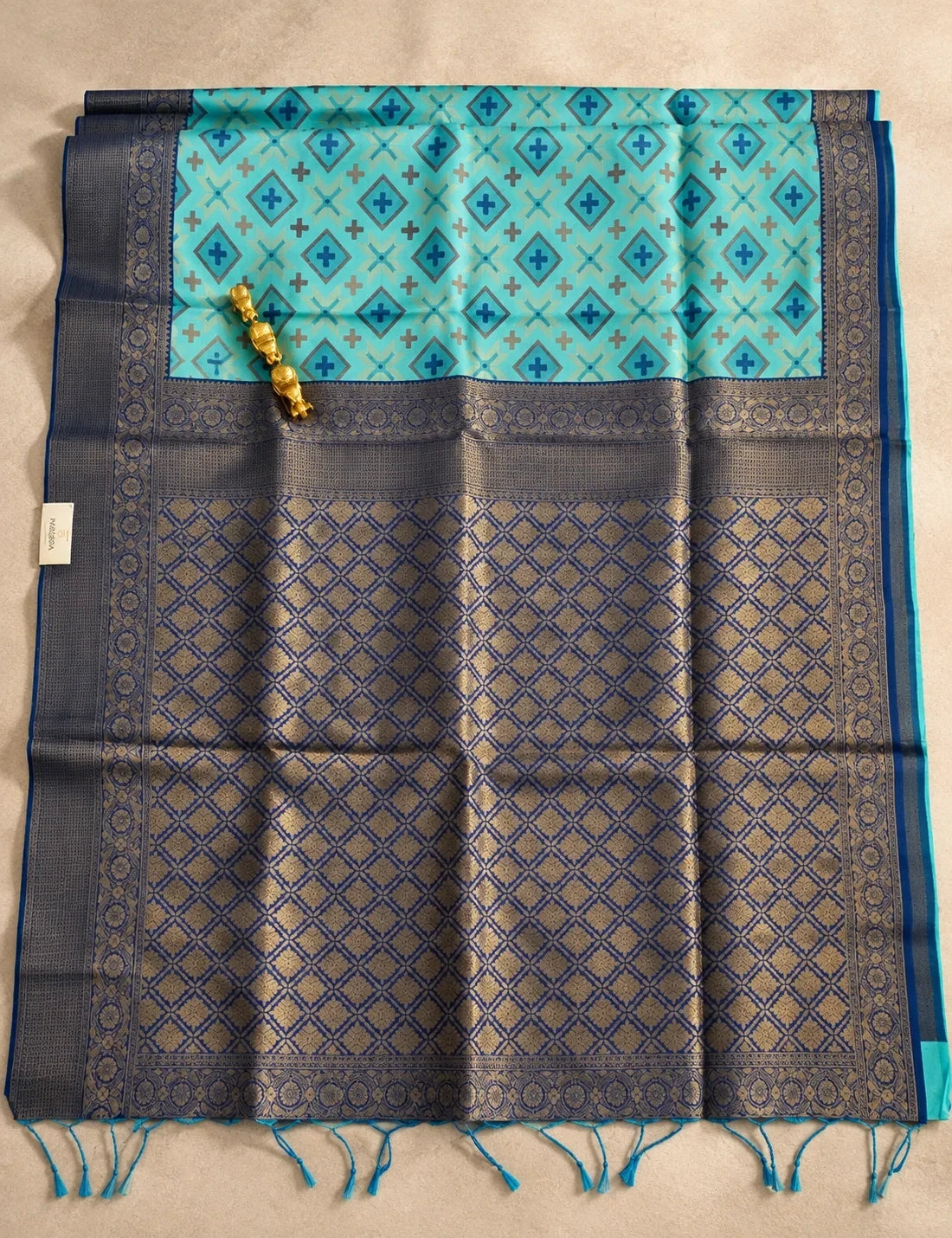 House Of Paramya teal blue Pochampally semi silk saree with geometric ikat pattern and navy zari temple border