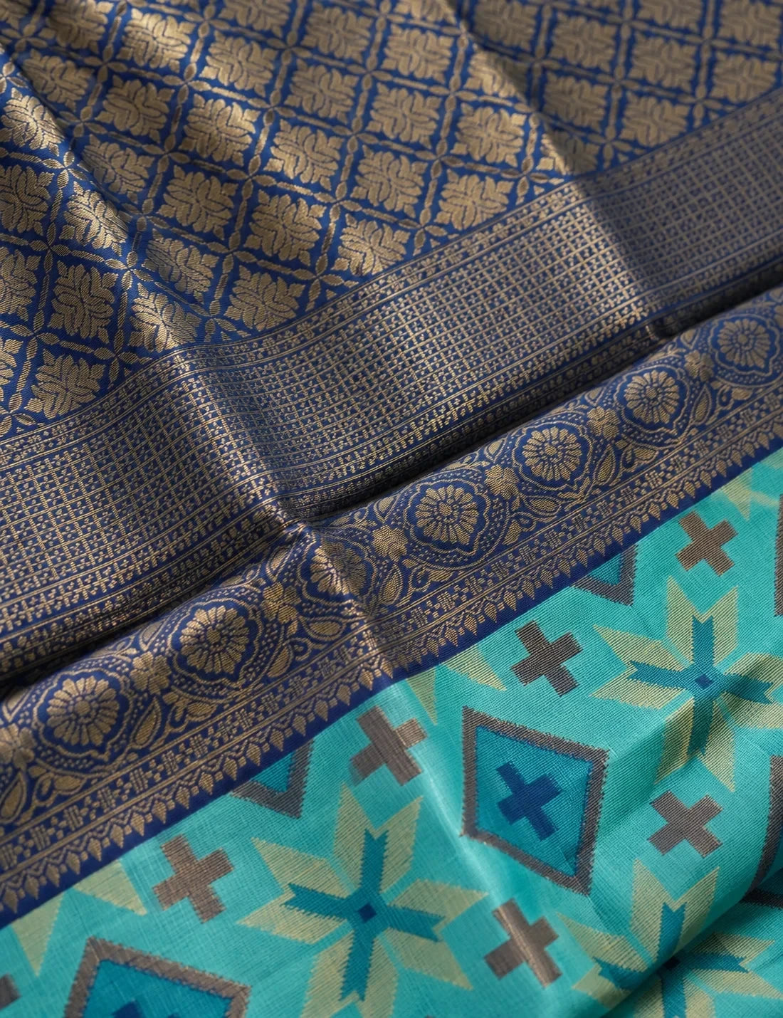 House Of Paramya teal blue Pochampally semi silk saree with geometric ikat pattern and navy zari temple border