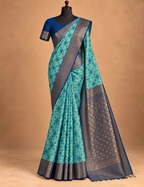 House Of Paramya teal blue Pochampally semi silk saree with geometric ikat pattern and navy zari temple border