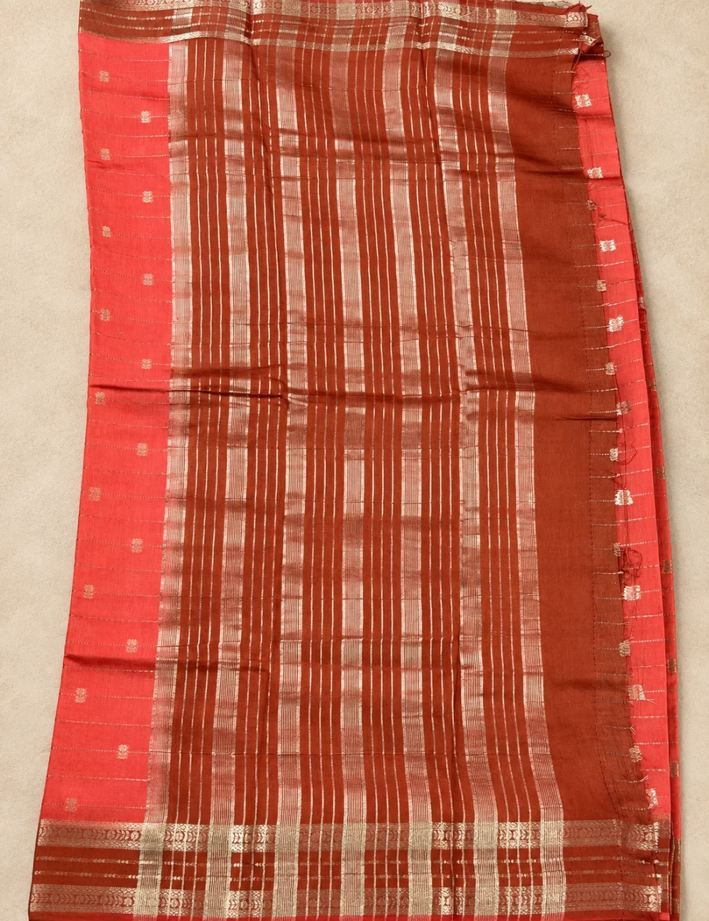 House Of Paramya turquoise Assam cotton saree with gold buti weave and a contrast purple border with floral motifs