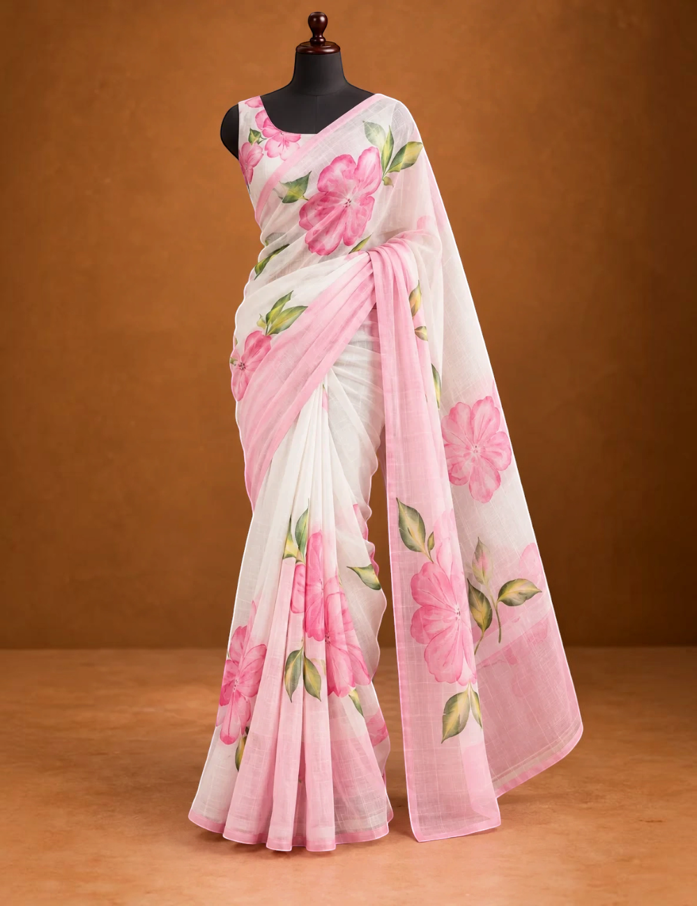 House Of Paramya white linen cotton saree featuring pink hibiscus floral prints and a delicate ombre border.