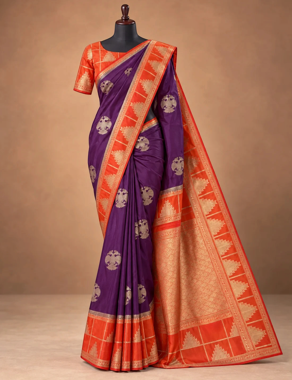 House Of Paramya deep wine Mysore silk saree with orange temple border and gold Gandaberunda motifs on a mannequin