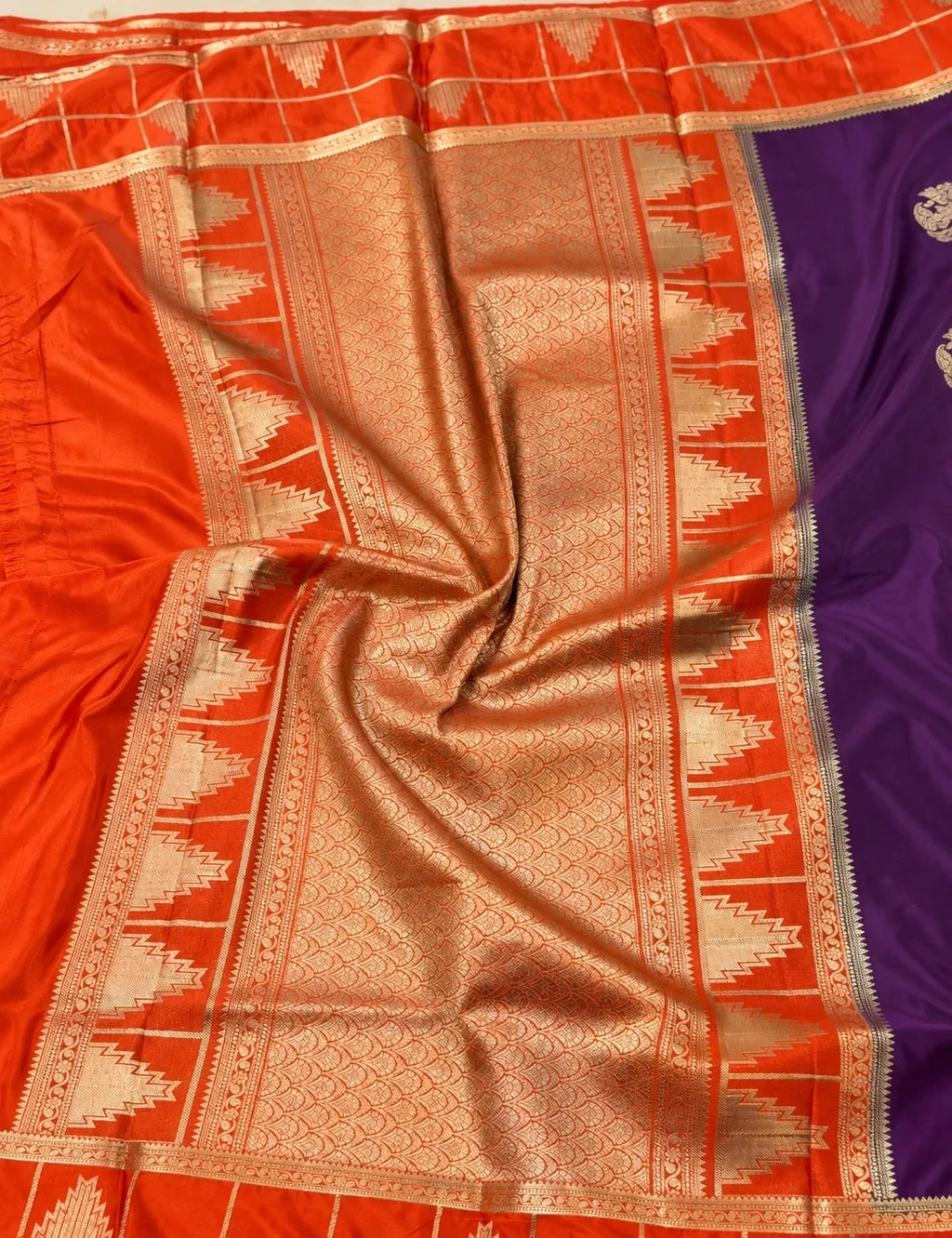House Of Paramya deep wine Mysore silk saree with a vibrant orange contrast border featuring intricate zari temple motifs.