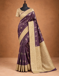 House Of Paramya deep wine tissue saree with gold leaf butta brocade and a wide beige border on a mannequin
