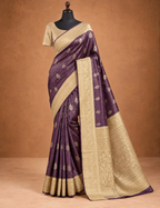 House Of Paramya deep wine tissue saree with gold leaf butta brocade and a wide beige border on a mannequin