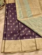 House Of Paramya deep wine temple tissue saree with gold leaf butta brocade and a contrasting beige border