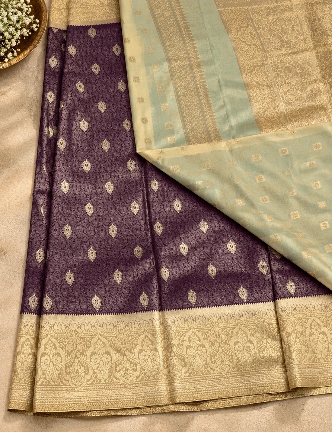 House Of Paramya deep wine temple tissue saree with gold leaf butta brocade and a contrasting beige border
