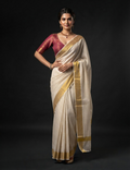 House Of Paramya ivory white pure cotton Kasavu saree with dotted texture and traditional gold zari border