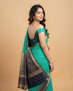Green and Navy Blue Crepe Silk Saree