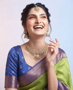 Navy Blue Kanchi Semi Silk Saree with Woven Leaf Pattern & Green Pallu