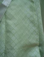 House Of Paramya sage green semi Kanchipuram silk saree featuring a delicate self-toned diamond lattice pattern